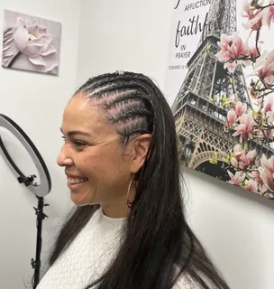 Young woman with braids, side profile