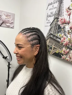Young woman with braids, side profile
