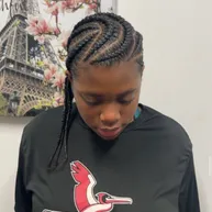 Cornrow braids swept back close to the head