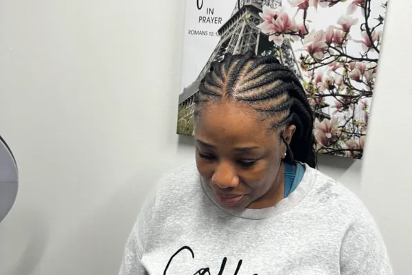 Cornrows swept back close to the scalp
