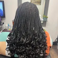 Box braids transitioning into loose curls