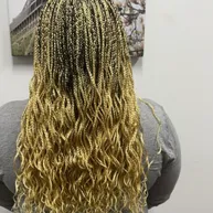 Golden ombre box braids with wavy curly ends