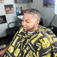 Men's cornrows with a skin fade