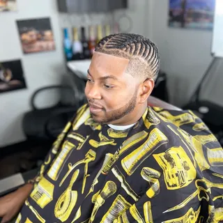 Men's cornrows with a skin fade