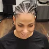 Randie B. wearing intricate cornrows