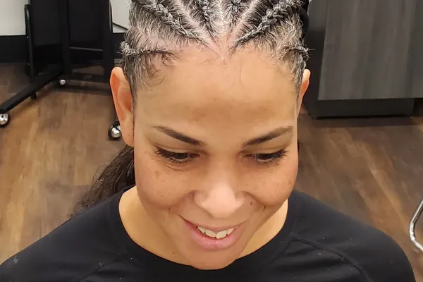 Randie B. wearing intricate cornrows