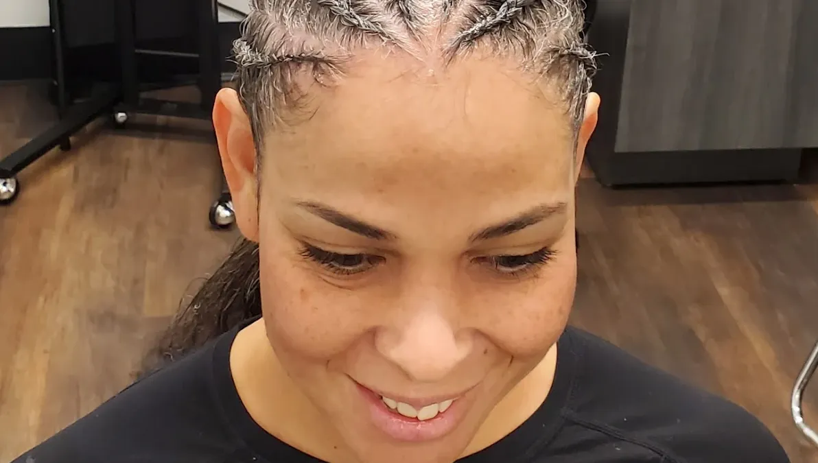 Randie B. wearing intricate cornrows